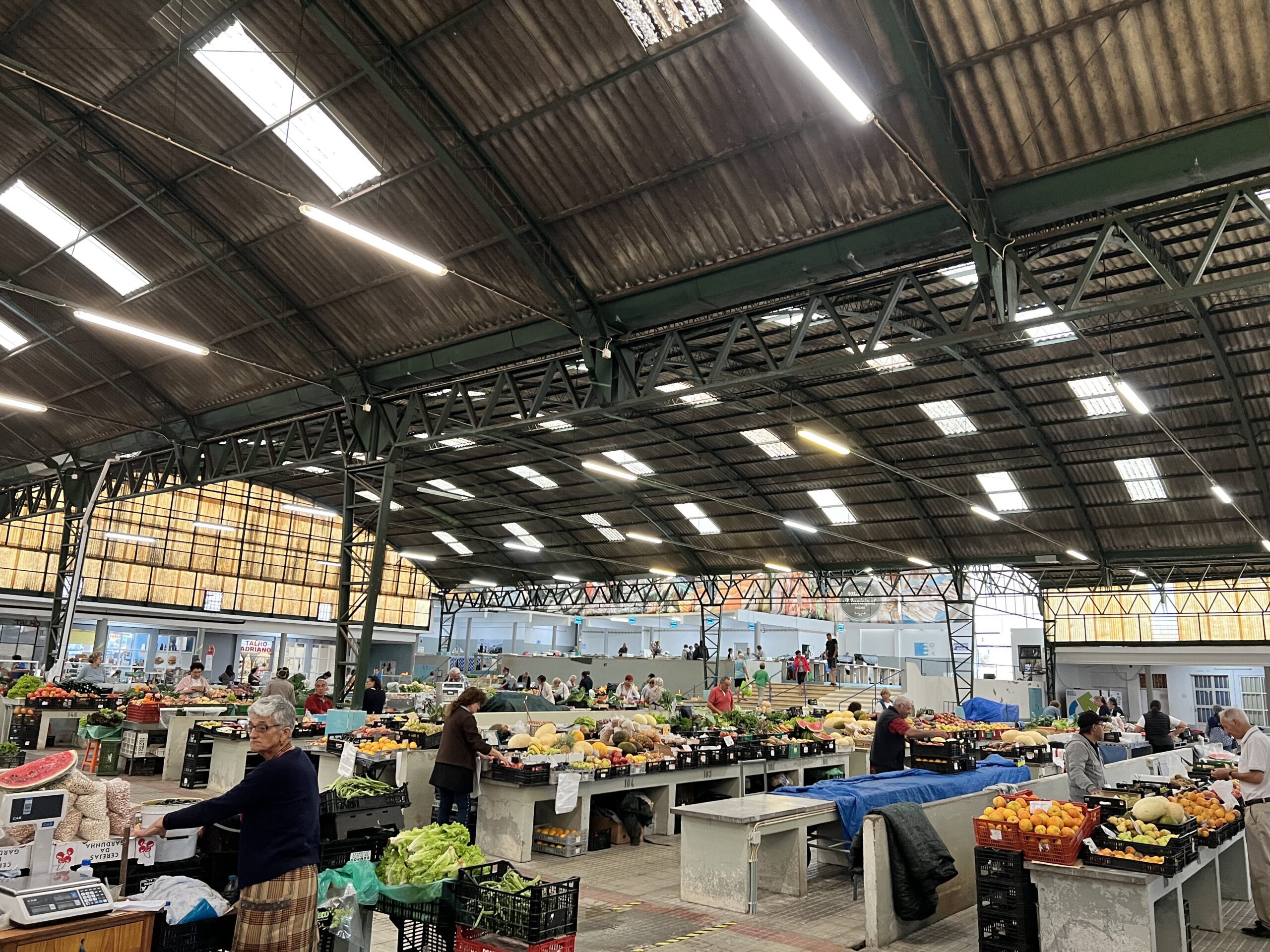 market to get grilled fish, fruits and other groceries.