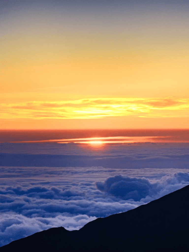 Haleakala National park up country maui travel tips - warm clothes to be above the clouds