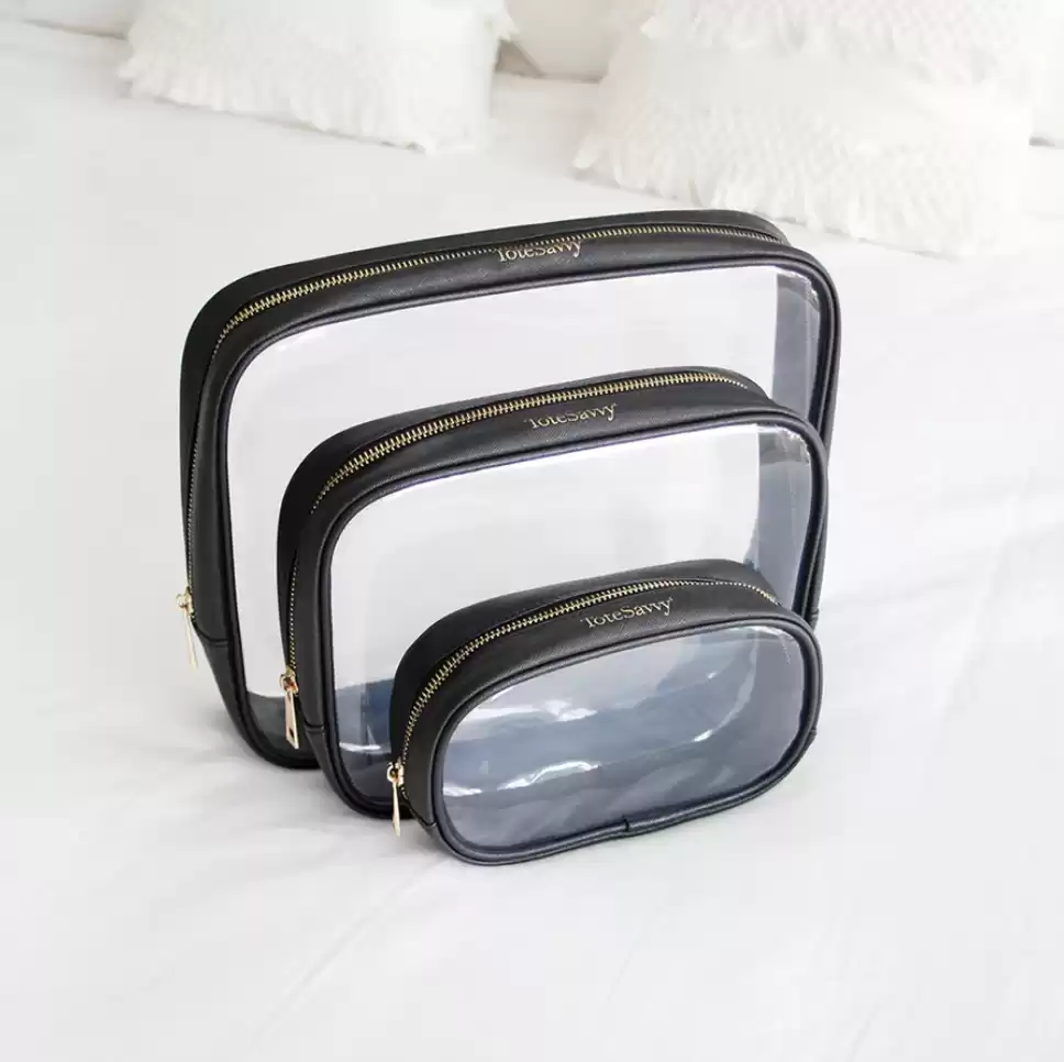travel makeup bag to make packing easier. ToteSavvy clear tote set that comes in black. The Clear Pouch Set is water-resistant and spill-proof as well as TSA-approved for the 3-1-1 liquids rule. packs flat, making it the perfect travel accessory.