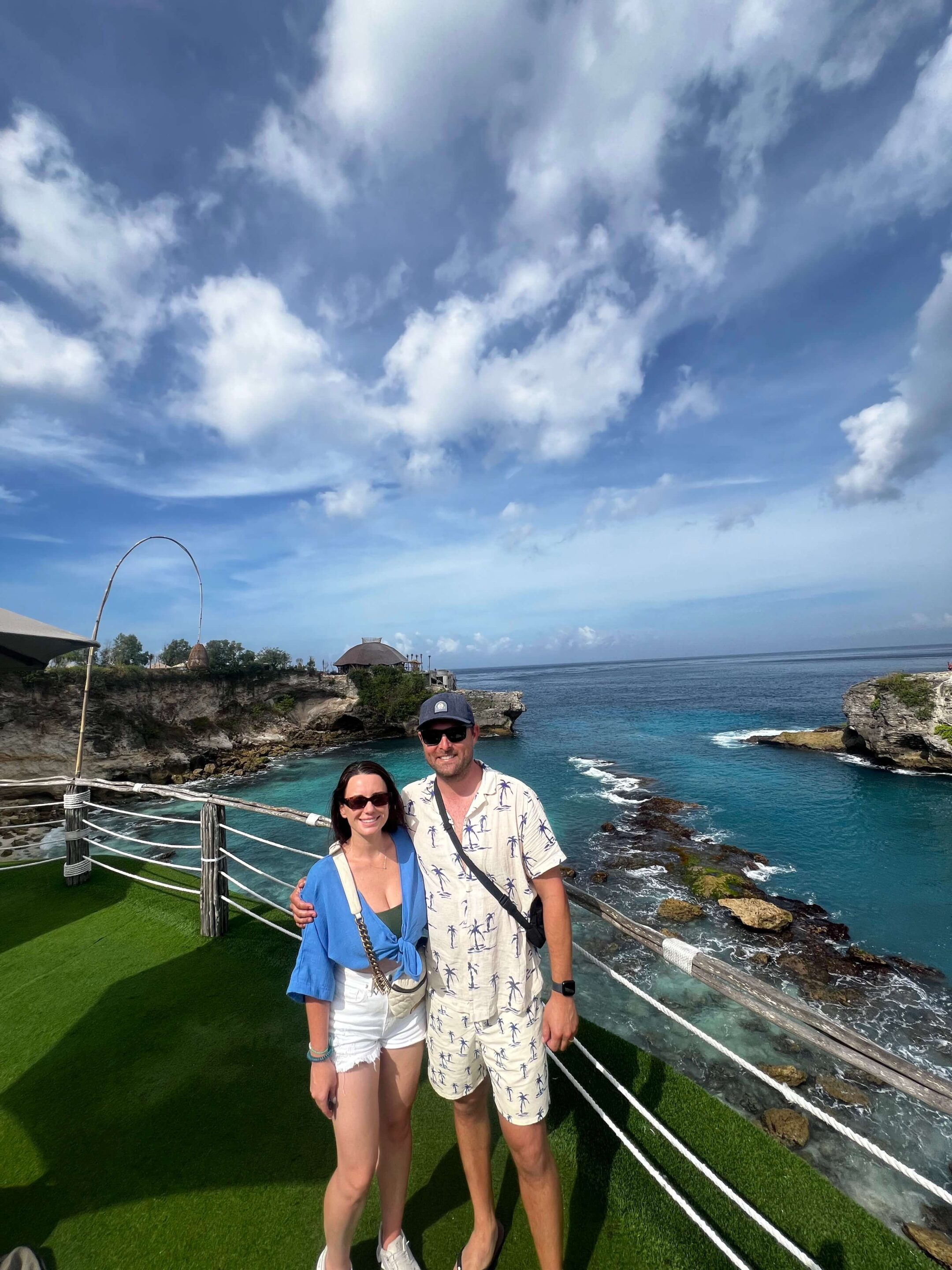 bali itinerary - michael and jordyn standing at Klyf club overlooking the blue lagoon